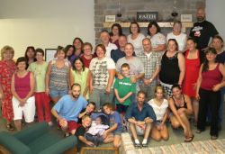 Camp Alumni pose for photo in the new dining hall at 2011 reunion at Douglas Camp grounds.