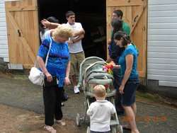 Christina Johnsons, right, checks out baby Benjamin