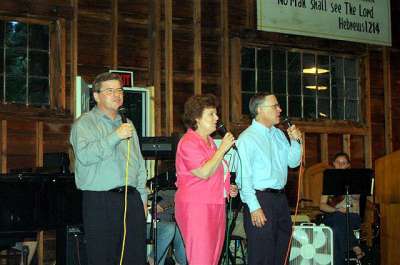 Steve, his wife Jan and his brother Nate sing for the Lord 