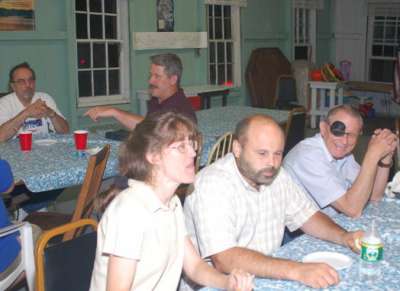 Jim and Rhonda break bread in the dining hall